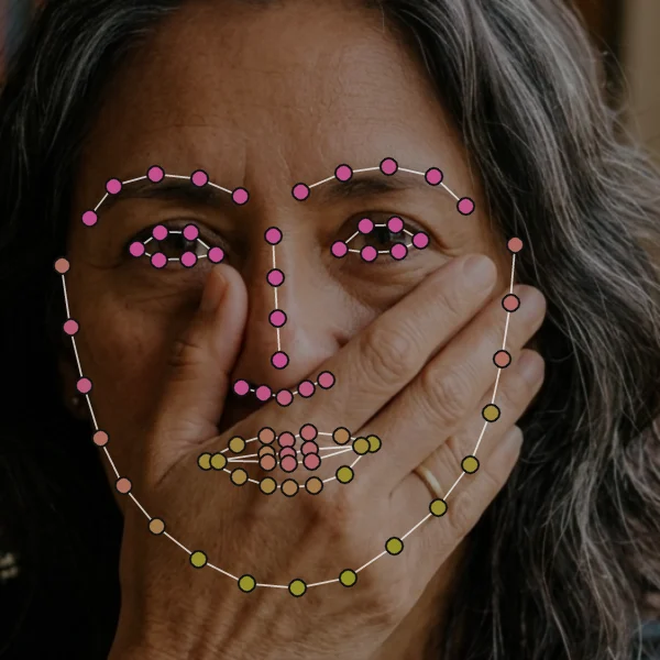 Hand over mouth: landmarks under the hand coloured olive, visible landmarks pink.